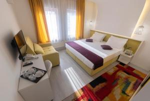 Katil atau katil-katil dalam bilik di Hotel Boutique Libris