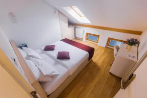 Katil atau katil-katil dalam bilik di Hotel Boutique Libris