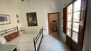 Postel nebo postele na pokoji v ubytování CasaDesigual