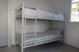 Voodi või voodid majutusasutuse Elbasan Backpacker Hostel toas