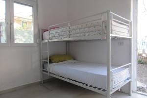 Postel nebo postele na pokoji v ubytování Elbasan Backpacker Hostel
