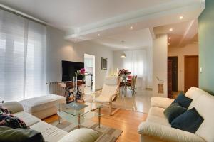 Ein Sitzbereich in der Unterkunft Apartments Villa Delia