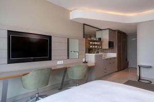TV a/nebo společenská místnost v ubytování Radisson Blu Hotel & Residence Maputo