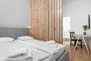 Posteľ alebo postele v izbe v ubytovaní Modern Centrally Located Apartments - by Upstairs