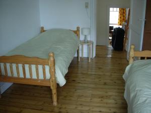 Een bed of bedden in een kamer bij Villa Ali Baba