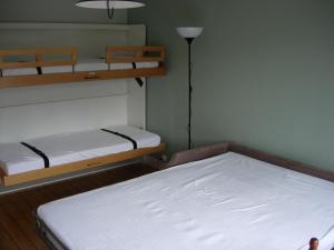 Een stapelbed of stapelbedden in een kamer bij Villa Ali Baba 