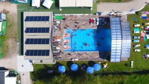 The swimming pool at or close to Hotel Arco Iris