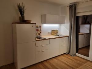 Kuchyň nebo kuchyňský kout v ubytování Apartment Breitscheid - Blick ins Grüne