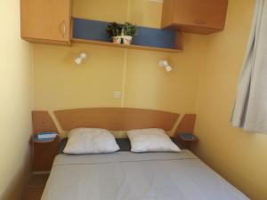 Postel nebo postele na pokoji v ubytování Escapades ensoleillées Climatisation Télévision
