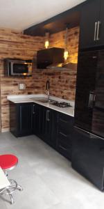 Afbeelding uit fotogalerij van CommonLens Inn in Entebbe