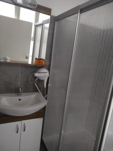 Koupelna v ubytování Romeo Beach Hotel