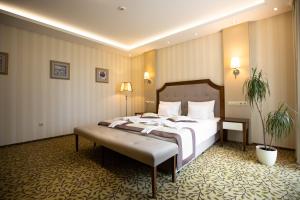 Posteľ alebo postele v izbe v ubytovaní Elixír Medical Wellness Hotel