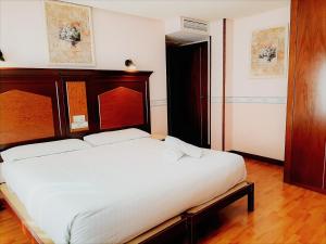 Postel nebo postele na pokoji v ubytování Hosteria Sara by gaiarooms