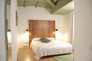 Postel nebo postele na pokoji v ubytování Albergo Il Rientro