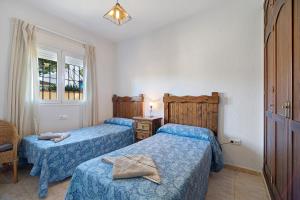 Postel nebo postele na pokoji v ubytování Villa Fátima + 18 fotografií