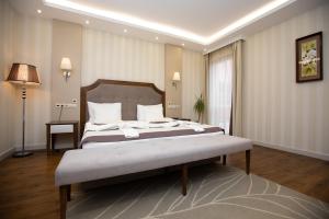 Posteľ alebo postele v izbe v ubytovaní Elixír Medical Wellness Hotel