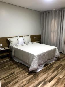 Postel nebo postele na pokoji v ubytování Hotel Reserva do Xingó