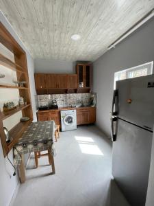 Köök või kööginurk majutusasutuses Koticha