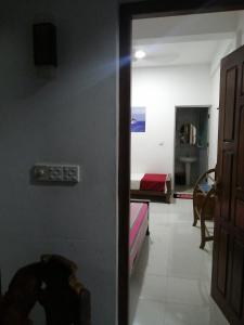 Voodi või voodid majutusasutuse Dive beach palace toas