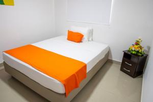 Postel nebo postele na pokoji v ubytování Hotel ITACO