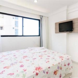 Voodi või voodid majutusasutuse Flat em Boa Viagem toas