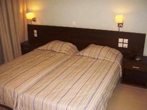 Postel nebo postele na pokoji v ubytování Hotel Electra