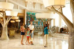 a group of people standing in a shopping mall at Moon Palace Jamaica in Ocho Rios
