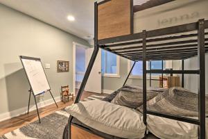 a bedroom with a bunk bed in a loft at Lake Harmony Townhome Less Than 1 Mi to Jack Frost! in Lake Harmony