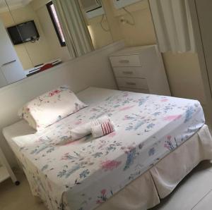 A bed or beds in a room at Flat em Boa Viagem