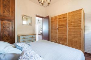 Postel nebo postele na pokoji v ubytování Casa Nicole