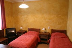 Postel nebo postele na pokoji v ubytování Sarlóspuszta Club Hotel + 26 fotografií