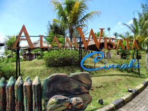a sign for aahuana channel in front of a park at Vila murah di dekat kawasan wisata lembang in Citeureup 1