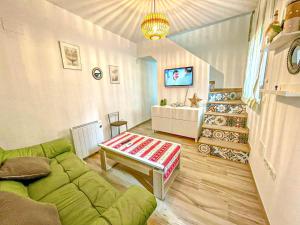 TV a/nebo společenská místnost v ubytování Casa Romero 33