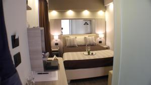Postel nebo postele na pokoji v ubytování Hotel Trapani In