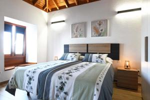 Ένα ή περισσότερα κρεβάτια σε δωμάτιο στο Casa Spica