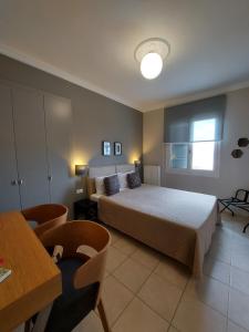 Postel nebo postele na pokoji v ubytování Leto Nuevo Hotel