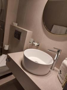 Koupelna v ubytování Leto Nuevo Hotel