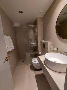 Koupelna v ubytování Leto Nuevo Hotel