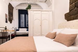 Postel nebo postele na pokoji v ubytování Agora Apartments - Armida