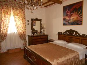 Tempat tidur dalam kamar di Podere Buriano