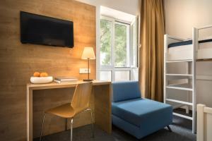 Ein Sitzbereich in der Unterkunft Remisens Hotel Epidaurus-All inclusive