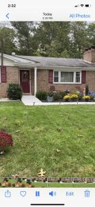 a picture of a house with the front yard at The Oasis in Clinton