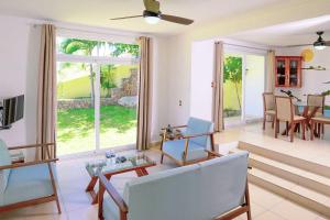 TV a/nebo společenská místnost v ubytování Villas & Resort Luz de Luna
