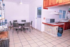Kuchyň nebo kuchyňský kout v ubytování Villas & Resort Luz de Luna
