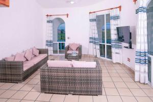 Posezení v ubytování Villas & Resort Luz de Luna