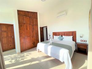 Postel nebo postele na pokoji v ubytování Villas & Resort Luz de Luna