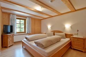 Легло или легла в стая в Ferienwohnungen-Gästehaus Altginzling