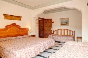 Postel nebo postele na pokoji v ubytování Hotel Rosa