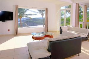 TV a/nebo společenská místnost v ubytování Villas & Resort Luz de Luna
