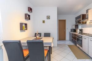 Kuchyňa alebo kuchynka v ubytovaní Apartment Teri